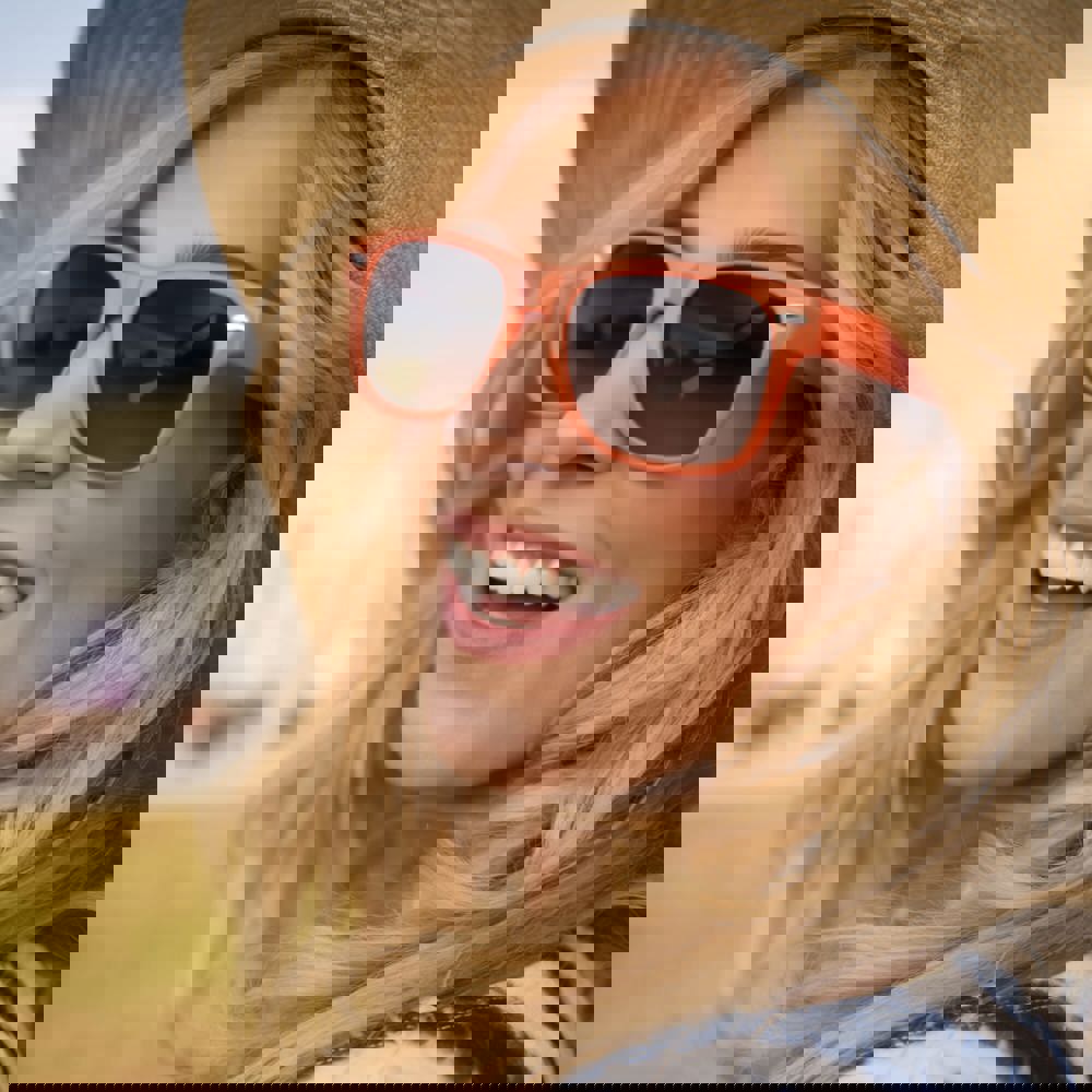 Cheerful blonde spending time outdoors - Hidalgo