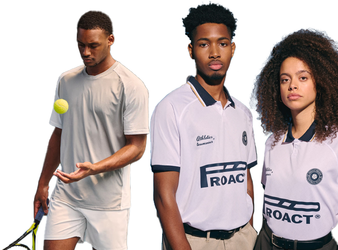 Three young tennis players on a court; left player tosses a ball while two teammates in white polo shirts stand beside him.