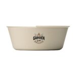Beige speckled grilling pan with a Garden Grill logo in the center on the side of the pan.