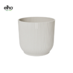 White ribbed plant pot with vertical grooves (empty) — by Elho into a modern cylindrical planter design, white ceramic-like finish.