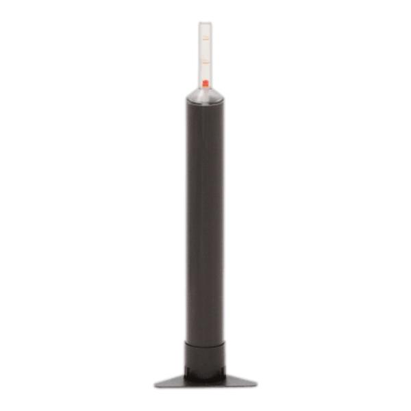 Tall black cylindrical device on a wide base with a clear vertical measuring tube at the top containing a red indicator.