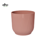 Elho pink ribbed plant pot with vertical grooves, cylindrical shape.