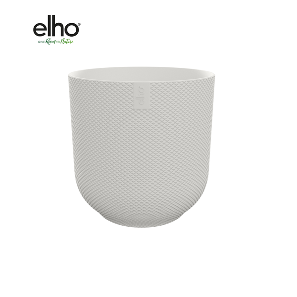 White textured plant pot with a diamond pattern and a rounded bottom; brand label 'elho' on the side.
