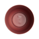 Top-down view of a red circular planter with inner ridges and the 'elho' logo on the bottom.