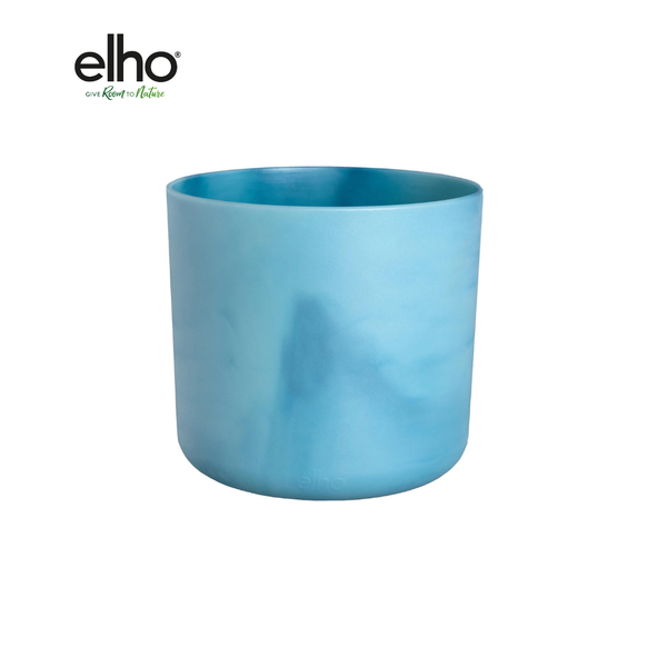 Blue cylindrical planter pot by Elho on a white background, empty and ready for plants.