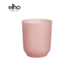 Pink ribbed planter by Elho on a white background, showcasing a soft pink color and vertical grooves.