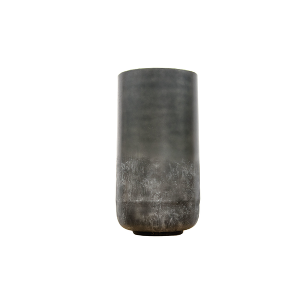 Gray metal cylinder standing upright on a white background, with a darker worn bottom edge and a small base visible underneath.