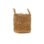 Woven wicker basket with two handles, used for storage against a white background.