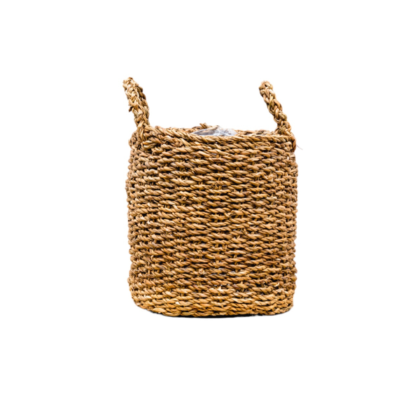 Woven straw basket with two handles, filled with tissue at the top.