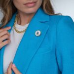 Woman Jewelery concept Woman hands close up wearing rings earrings - Hidalgo