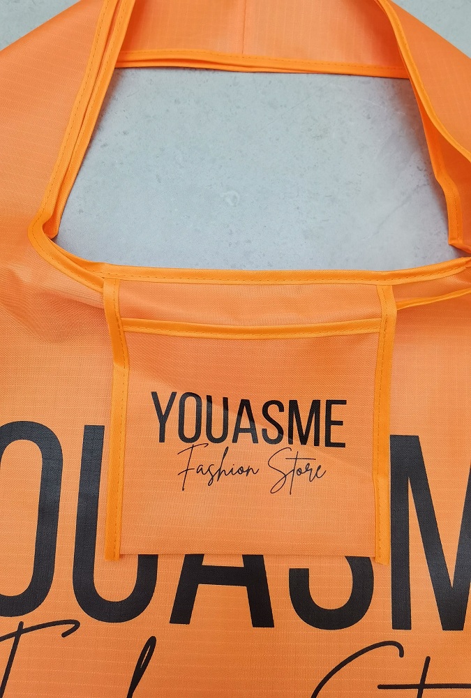 Opvouwbare boodschappentas opgevouwen in etui, oranje